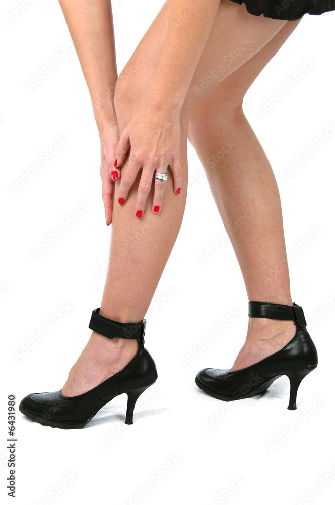 Beautiful legs on high heels isolated on white Beautiful legs on high heels isolated on white