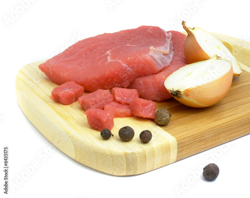 meat food on the board isolated over white background