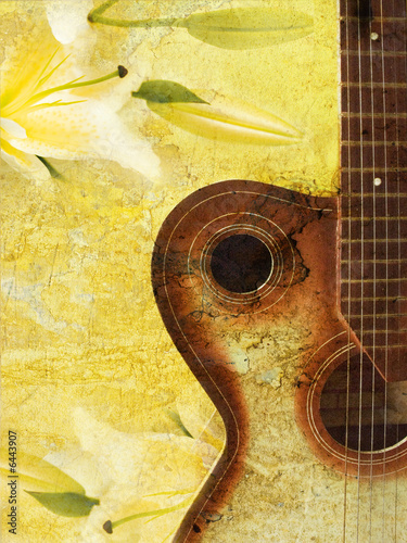 vintage grunge background with guitar on wall