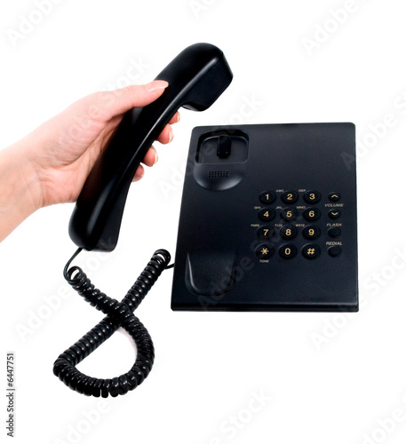 phone ring in human hand on white using telephone photo