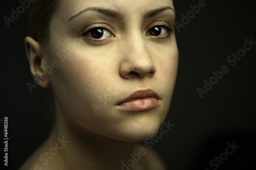 Fine art portrait of elegant girl. Studio photo. Beautiful woman