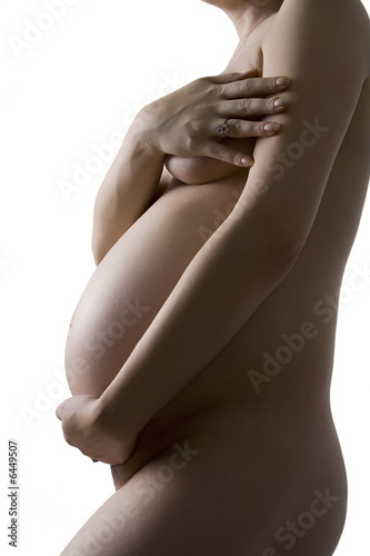 Young female in thrid trimester of pregnancy. photo