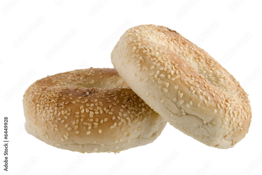 Two bagels with sesame seeds isolated on white Two bagels with sesame seeds isolated on white