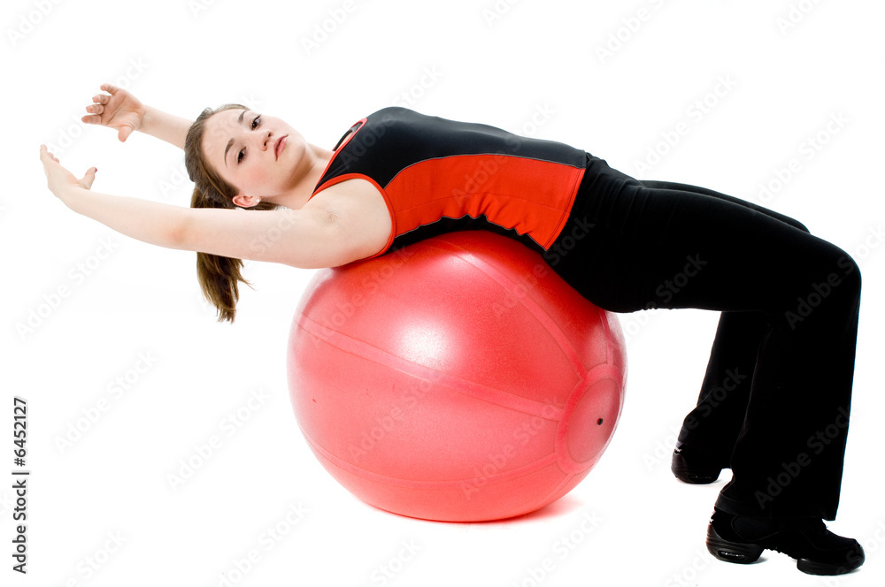 A young caucasian girl doing different stretches A young caucasian girl doing different stretches