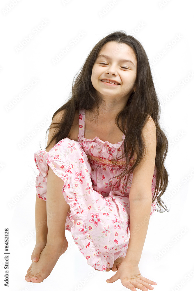 Young girl posing on a white background. Young girl posing on a white background.