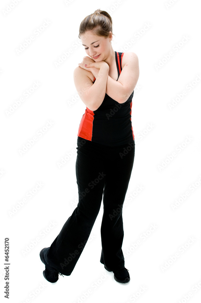 A young caucasian girl doing different stretches A young caucasian girl doing different stretches
