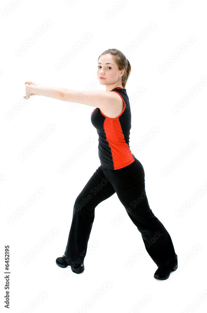 A young caucasian girl doing different stretches A young caucasian girl doing different stretches