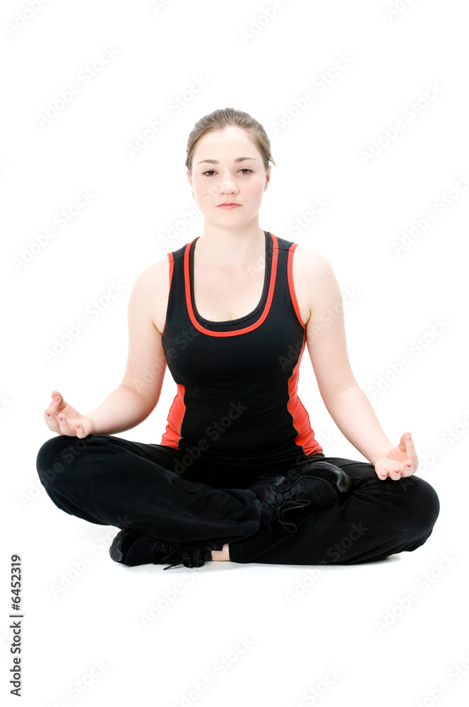 A young caucasian girl doing different stretches A young caucasian girl doing different stretches