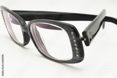 Black eyeglasses on white background