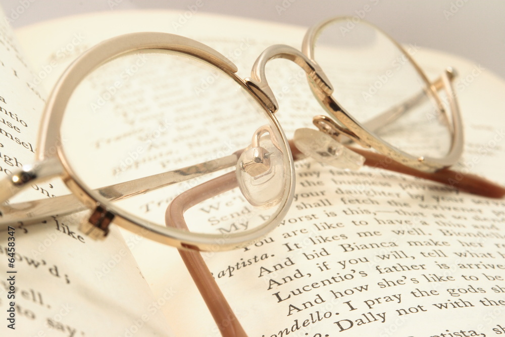 William Shakespare's book with eyeglasses William Shakespare's book with eyeglasses