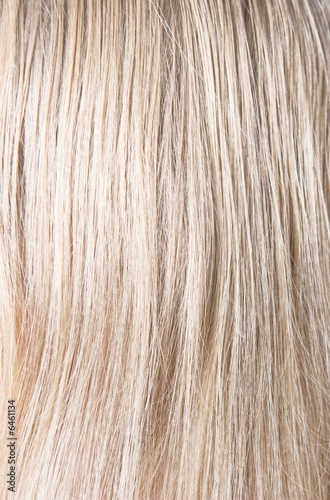 Blond woman hair texture or background.