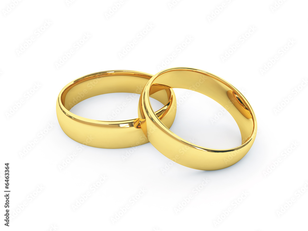 Wedding golden rings one over another. Isolated. Wedding golden rings one over another. Isolated.
