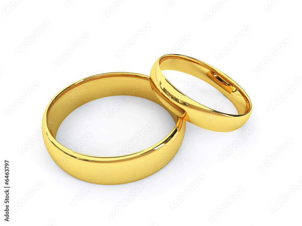 Wedding golden rings one over another. Isolated.
