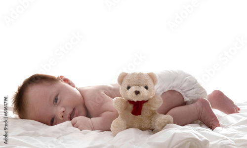 a little baby boy with his bear
