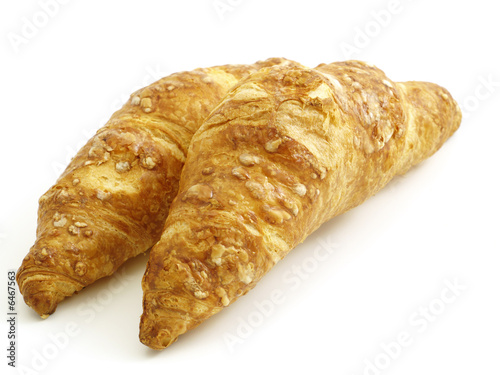 Two croissants isolated on white background
