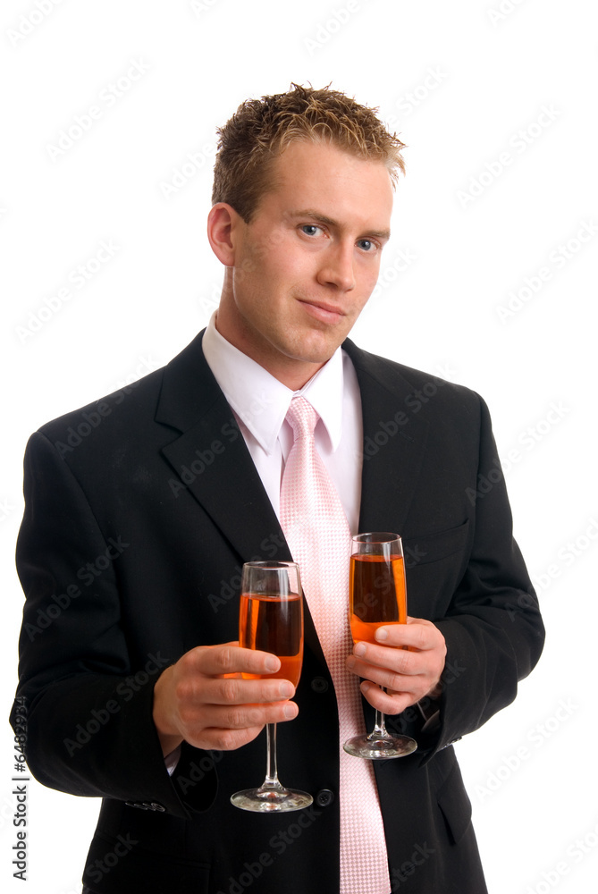 A handsome young man holding glasses of wine