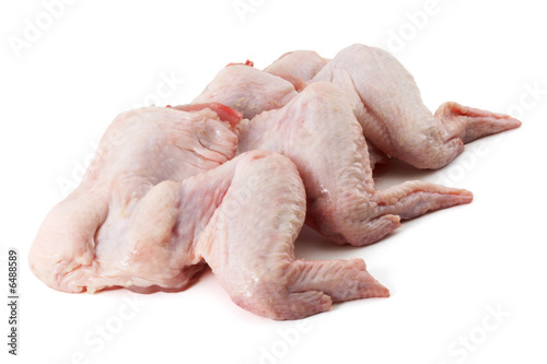 Three raw chicken wing on white background