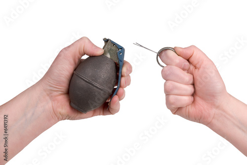 Slika na platnu Hand grenade in a woman's hand with the pin pulled