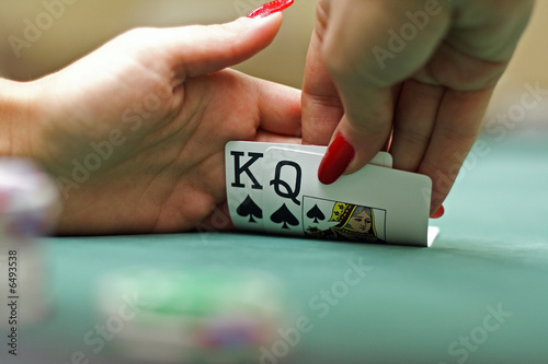 Cards in hands photo