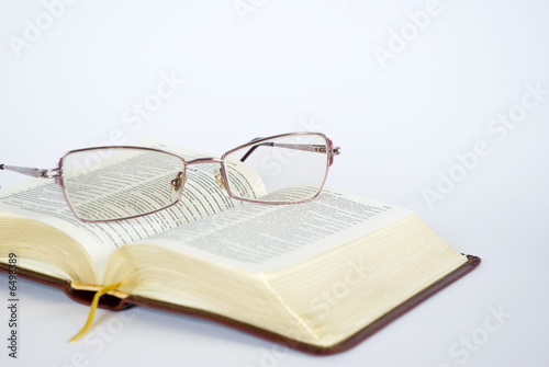 Spectacles and book