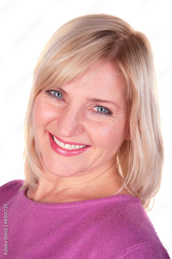 middleaged woman in pink shirt face close-up middleaged woman in pink shirt face close-up