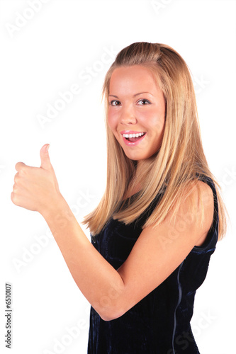 girl shows gesture Ok by the thumb