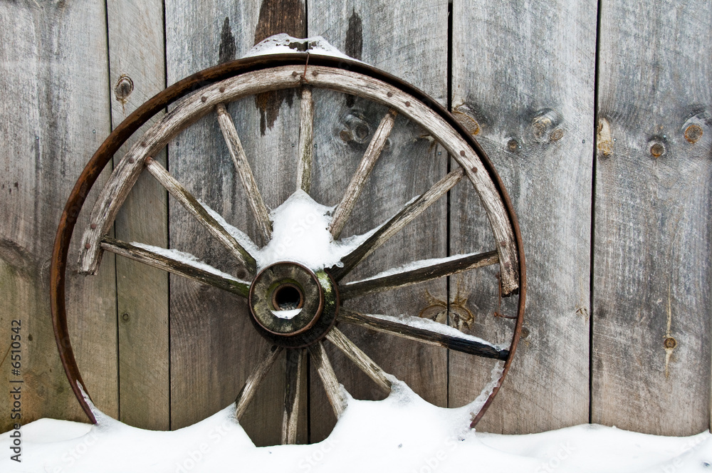 background old rusty wheel and board wall background old rusty wheel and board wall
