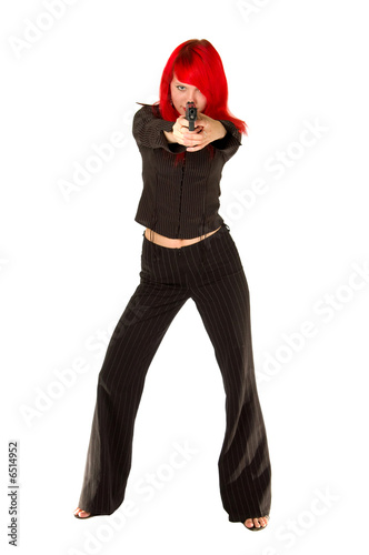 Redhead girl aiming at you