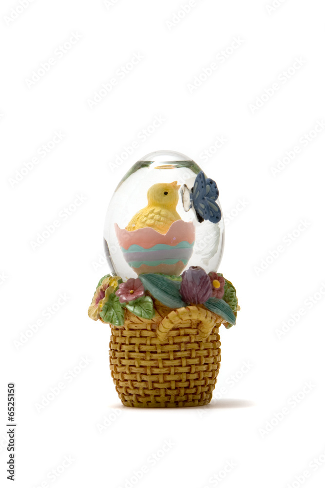 Easter chick in glass egg