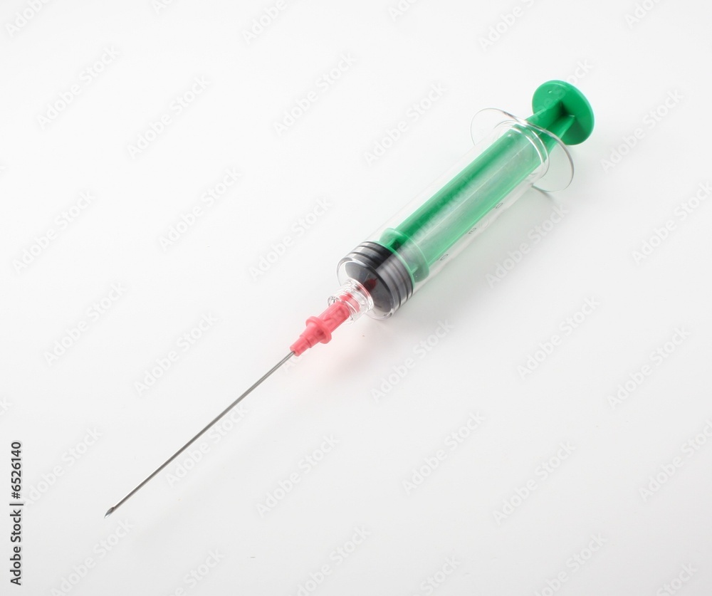 green syringe with needle green syringe with needle