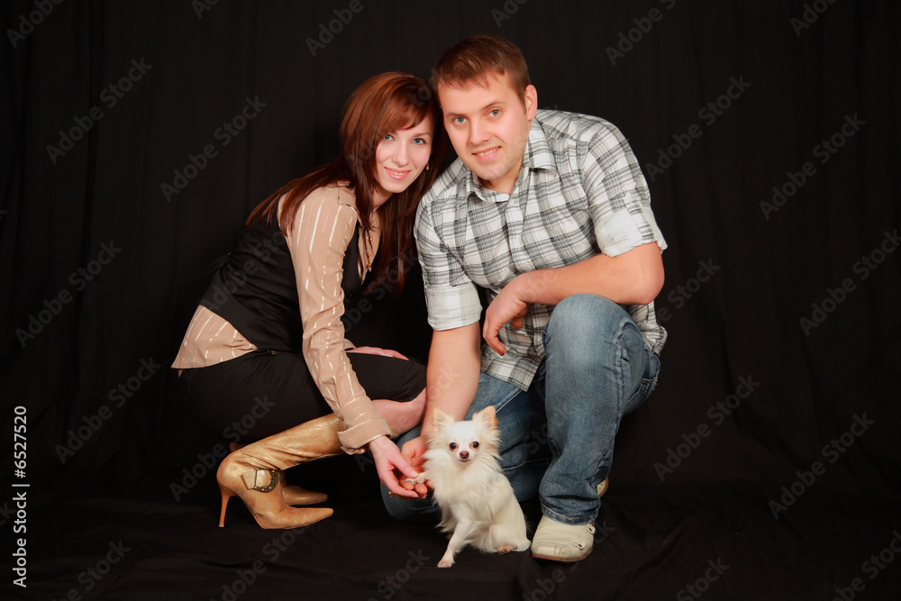 Obraz premium Couple with dog.