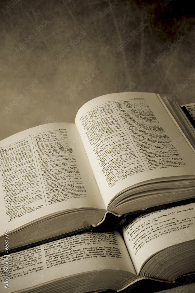 Fototapeta premium Open old books in sepia