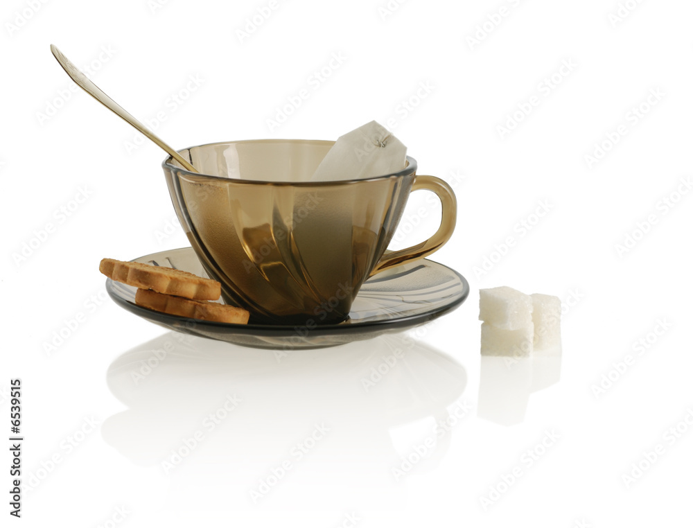 cup with cookie, spoon, sugar anf package tea cup with cookie, spoon, sugar anf package tea