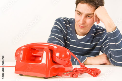man waiting for a call