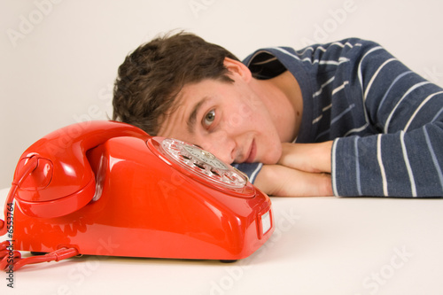 man waiting for a call