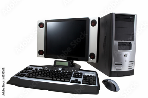 desktop computer with lcd monitor, keyboard, speaker and mouse,