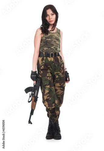 The beautiful girl with a  automatic rifle