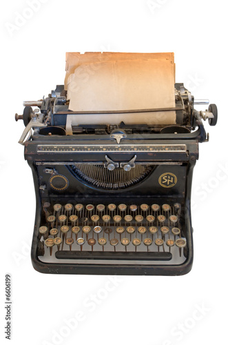 Old typewriter with a sheet of paper