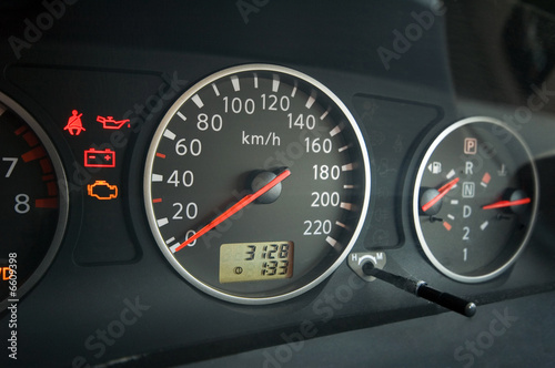 Close up of car dashboard with speedometer