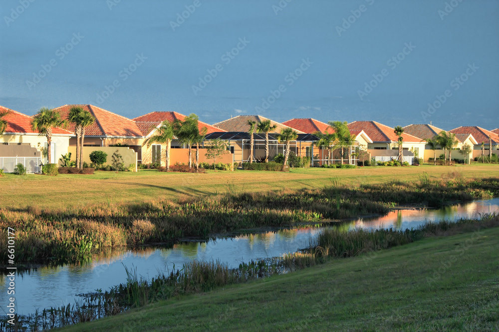 Tropical Florida housing tract with canal