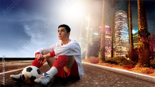 soccer player in the city 2 photo