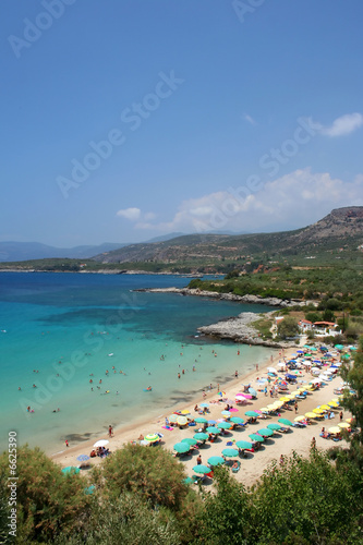 Mediterranean sea beach in Greece full of tourists