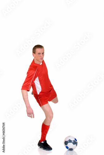 Fototapeta Naklejka Na Ścianę i Meble -  Young male soccer player
