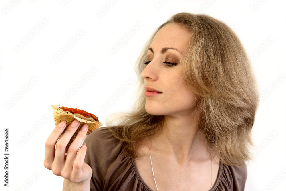 Blonde girl and pancake with caviar Blonde girl and pancake with caviar