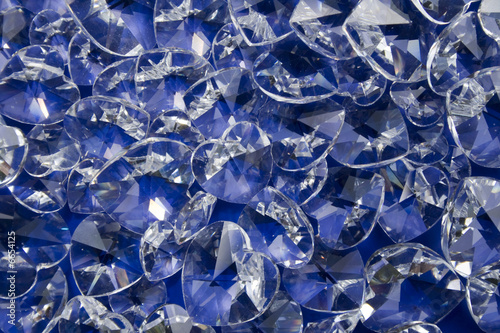 Sparkling Crystal Hearts on Blue Background
