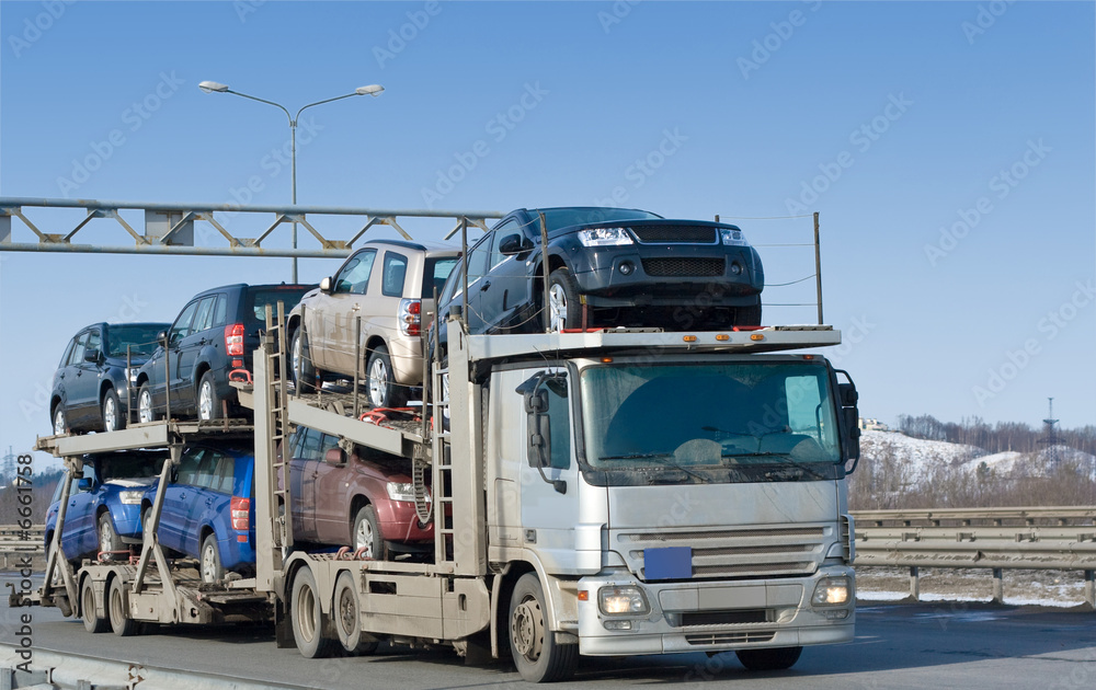  car carrier truck deliver new auto batch to dealer