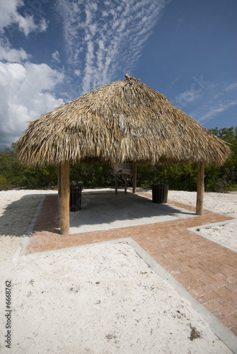 tiki hut thatch roof coco plum beach florida keys photo