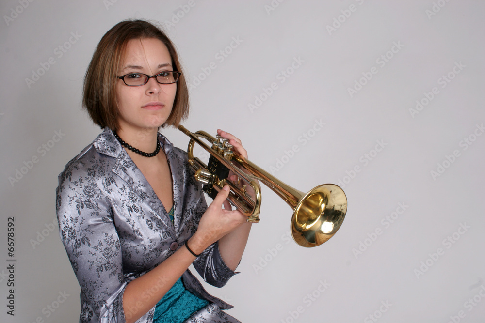 Woman playing trumpet Stock Photo