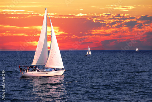 Canvas Sailboats at sunset