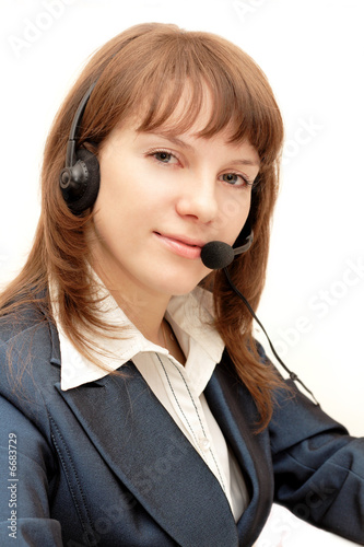 smiling young girl with microphone over white background